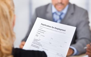 business woman holding application form